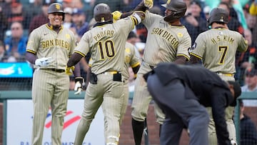 SAN FRANCISCO, CALIFORNIA - APRIL 06: Jurickson Profar #10 of the San Diego Padres celebrates with teammates after he hit a grand slam home run against the San Francisco Giants in the top of the first inning at Oracle Park on April 06, 2024 in San Francisco, California.   Thearon W. Henderson/Getty Images/AFP (Photo by Thearon W. Henderson / GETTY IMAGES NORTH AMERICA / Getty Images via AFP)