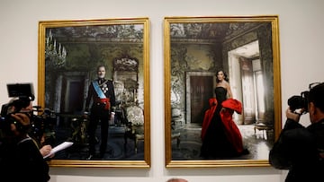 Members of the media work next to the portraits of Spain's King Felipe and Queen Letizia by U.S. photographer Annie Leibovitz during a media presentation as part of the exhibition "La tirania de Cronos", at the Bank of Spain in Madrid, Spain, November 25, 2024. REUTERS/Susana Vera NO RESALES. NO ARCHIVES
