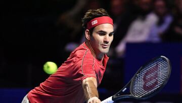 Swiss Roger Federer returns a ball to German Peter Gojowczyk during the 1,500th match of his career at the opening day of the Swiss Indoors tennis tournament on October 21, 2019 in Basel. - Roger Federer check off another landmark on October 21, 2019 when he starts his bid for a 10th Basel title by playing the 1,500th match of his career. (Photo by FABRICE COFFRINI / AFP)