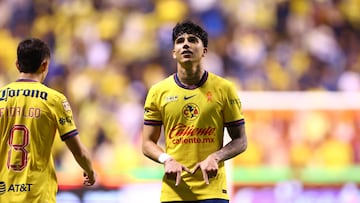 Soccer Football - Liga MX - Final - First Leg - America v Monterrey - Estadio Cuauhtemoc, Puebla, Mexico - December 12, 2024 America's Kevin Alvarez celebrates scoring their first goal with America's Alvaro Fidalgo REUTERS/Raquel Cunha