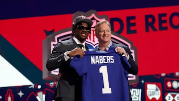 DETROIT, MICHIGAN - APRIL 25: (L-R) Malik Nabers poses with NFL Commissioner Roger Goodell after being selected sixth overall by the New York Giants during the first round of the 2024 NFL Draft at Campus Martius Park and Hart Plaza on April 25, 2024 in Detroit, Michigan.   Gregory Shamus/Getty Images/AFP (Photo by Gregory Shamus / GETTY IMAGES NORTH AMERICA / Getty Images via AFP)