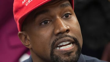 (COMBO) This combination of pictures created on October 07, 2022 shows
a file photo taken on October 11, 2018 of Kanye West in Washington, DC and 
a file photo taken on April 21, 2022 showing the corporate logo of German sports equipment maker Adidas in Herzogenaurach, southern Germany. - German sportswear giant Adidas on October 7, 2022 said it was reconsidering its partnership with Kanye West after the US rap star publicly criticised the brand.
"After repeated efforts to privately resolve the situation, we have taken the decision to place the partnership under review," the company said in a statement. (Photo by SAUL LOEB and Christof STACHE / AFP)