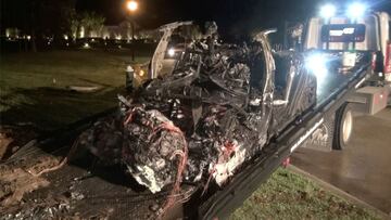 The remains of a Tesla vehicle are seen after it crashed in The Woodlands, Texas, April 17, 2021, in this still image from video obtained via social media. Video taken April 17, 2021. SCOTT J. ENGLE via REUTERS  ATTENTION EDITORS - THIS IMAGE HAS BEEN SUP