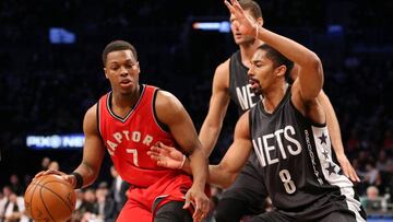 Feb 5, 2017; Brooklyn, NY, USA; Toronto Raptors point guard Kyle Lowry (7) dribbles the ball as Brooklyn Nets point guard Spencer Dinwiddie (8) defends during the second quarter at Barclays Center. Mandatory Credit: Brad Penner-USA TODAY Sports