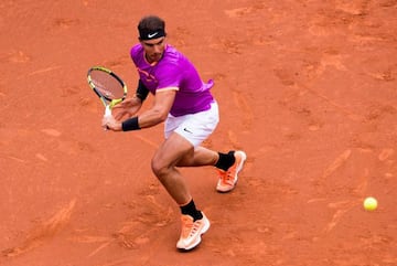 Rafa Nadal in action against Dominic Thiem in Barcelona today.