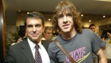 <b>AL ATAQUE. </b>Laporta, en la foto con Puyol, volvió a cargar con dureza contra la Junta de Rosell.