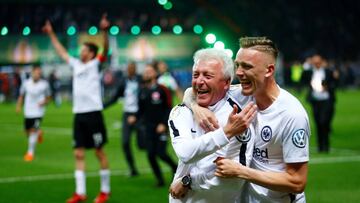 Soccer Football - DFB Cup Final - Bayern Munich vs Eintracht Frankfurt - Olympiastadion, Berlin, Germany - May 19, 2018 Eintracht Frankfurt's Marius Wolf celebrates with a member of the coaching staff after winning the DFB Cup REUTERS/Hannibal Ha