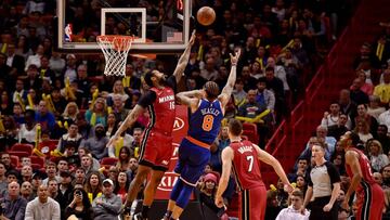 Jan 5, 2018; Miami, FL, USA; Miami Heat forward James Johnson (16) blocks a shot from New York Knicks forward Michael Beasley (8) during the second half at American Airlines Arena. Miami won 107-103 in overtime. Mandatory Credit: Steve Mitchell-USA TODAY Sports