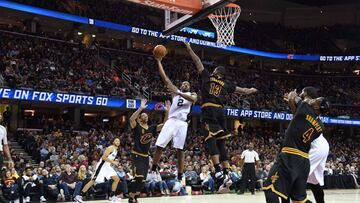 CLEVELAND, OH - JANUARY 21: Kawhi Leonard #2 of the San Antonio Spurs shoots over Tristan Thompson #13 of the Cleveland Cavaliers during the second half at Quicken Loans Arena on January 21, 2017 in Cleveland, Ohio. The Spurs defeated the Cavaliers 118-115. NOTE TO USER: User expressly acknowledges and agrees that, by downloading and/or using this photograph, user is consenting to the terms and conditions of the Getty Images License Agreement. Mandatory copyright notice.   Jason Miller/Getty Images/AFP
 == FOR NEWSPAPERS, INTERNET, TELCOS &amp; TELEVISION USE ONLY ==