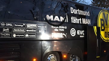 Borussia Dortmund&#039;s damaged bus is pictured after an explosion some 10km away from the stadium prior to the UEFA Champions League 1st leg quarter-final football match BVB Borussia Dortmund v Monaco in Dortmund, western Germany on April 11, 2017. / AF