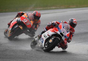 Dovizioso claims Malaysia GP ahead of Rossi and Lorenzo