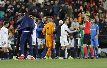 Valencia and Getafe players were involved in a brawl at the end of their Copa del Rey match that saw Valencia score twice in 45 seconds to go through.