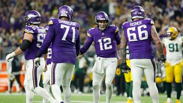 Nick Mullens #12 of the Minnesota Vikings celebrates with teammates