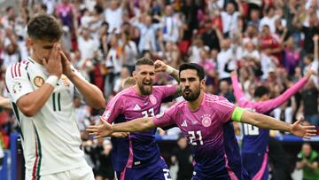 Germany's midfielder #21 Ilkay Gundogan celebrates scoring his team's second goal during the UEFA Euro 2024 Group A football match between Germany and Hungary at the Stuttgart Arena in Stuttgart on June 19, 2024. (Photo by THOMAS KIENZLE / AFP)