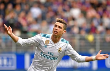 Real Madrid's Portuguese forward Cristiano Ronaldo celebrates after scoring a goal during the Spanish league football match between Eibar and Real Madrid at the Ipurua stadium in Eibar on March 10, 2018.