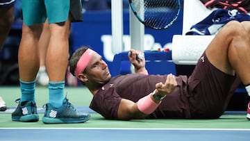 Sep 1, 2022; Flushing, NY, USA; Rafael Nadal of Spain lays down after an injury to his nose during a match against Fabio Fognini of Italy on day four of the 2022 U.S. Open tennis tournament at USTA Billie Jean King Tennis Center. Mandatory Credit: Danielle Parhizkaran-USA TODAY Sports