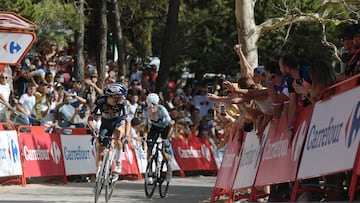 Team Bora's Primoz Roglic (L) looks backwards as he rides to the finish followed by Team Movistar's Enric Mas (R), at the end of the stage 8 of La Vuelta a Espana cylcing tour, a 159 km race between Ubeda and Cazorla, on August 24, 2024. (Photo by Jorge GUERRERO / AFP)