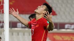 China&#039;s WU Lei celebrates after scoring during the 2022 FIFA World Cup qualification group A football match between China and Syria at the Sharjah Football Stadium in Sharjah on June 15, 2021. (Photo by Karim SAHIB / AFP)