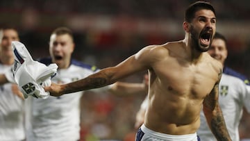 Soccer Football - World Cup - UEFA Qualifiers - Group A - Portugal v Serbia - Estadio da Luz, Lisbon, Portugal - November 14, 2021 Serbia&#039;s Aleksandar Mitrovic celebrates scoring their second goal REUTERS/Pedro Nunes