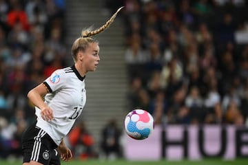 Germany's Giulia Gwinn jumps for the ball during the UEFA Women's Euro 2022 semi-final football match between Germany and France.