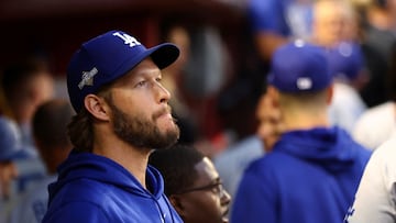 FILE PHOTO: Oct 11, 2023; Phoenix, Arizona, USA; Los Angeles Dodgers starting pitcher Clayton Kershaw (22) in the dug out during game three of the NLDS for the 2023 MLB playoffs against the Arizona Diamondbacks at Chase Field. Mandatory Credit: Mark J. Rebilas-USA TODAY Sports/File Photo