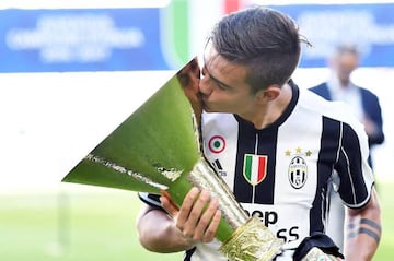 Juventus' forward Paulo Dybala celebrates the 2016-2017 Italian Serie A Championship. Next stop, Cardiff.