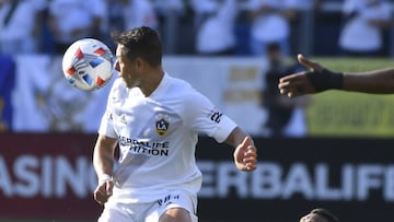 Javier &#039;Chicharito&#039; Hern&aacute;ndez (LA Galaxy) receiving a tackle from Eddie Segura (LAFC).