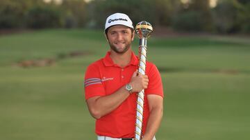 DUBAI, UNITED ARAB EMIRATES - NOVEMBER 19: Jon Rahm of Spain poses with the trophy after winning the DP World Tour Championship at Jumeirah Golf Estates on November 19, 2017 in Dubai, United Arab Emirates. (Photo by Andrew Redington/Getty Images)