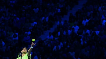 Spain's Carlos Alcaraz serves during his round-robin match against Russia's Andrey Rublev at ATP Finals tennis tournament in Turin on November 15, 2023. (Photo by Tiziana FABI / AFP)