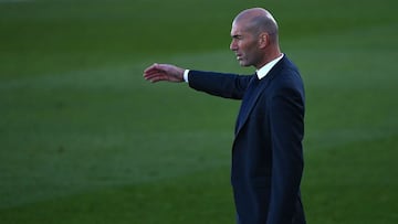 Real Madrid's French coach Zinedine Zidane reacts during the Spanish League football match between Real Madrid and Elche at the Alfredo Di Stefano stadium in Valdebebas, northeast of Madrid, on March 13, 2021. (Photo by GABRIEL BOUYS / AFP)
