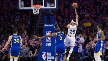 Mar 2, 2019; Philadelphia, PA, USA; Philadelphia 76ers guard Ben Simmons (25) scores past Golden State Warriors center DeMarcus Cousins (0) during the first quarter at Wells Fargo Center. Mandatory Credit: Bill Streicher-USA TODAY Sports