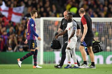 Naby Keita leaves the pitch after suffering a groin injury.