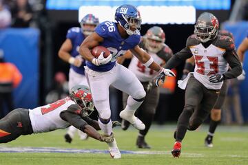 El running back demostr¨® un gran poder en su duelo frente a los Bucs. (33.20)