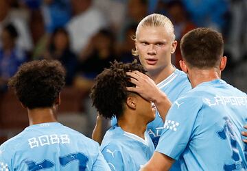 Soccer Football - Pre Season Friendly - Yokohama F Marinos v Manchester City - Japan National Stadium, Tokyo, Japan - July 23, 2023 Manchester City's Erling Braut Haaland celebrates scoring their third goal with teammates REUTERS/Kim Kyung-Hoon