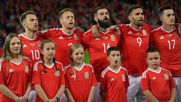CARDIFF, UNITED KINGDOM - OCTOBER 09:  Wales players sing the national anthem prior to the FIFA 2018 World Cup Group D  Qualifier between Wales and Republic of Ireland at the Cardiff City Stadium on October 9, 2017 in Cardiff, Wales.  (Photo by Stu Forster/Getty Images)