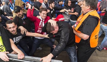 Liverpool and Sevilla fans fight in Basel