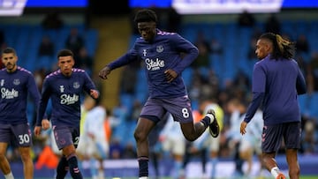 Everton's Amadou Onana (centre) warms up on the pitch ahead of the Premier League match at the Etihad Stadium, Manchester. Picture date: Saturday December 31, 2022. (Photo by Tim Goode/PA Images via Getty Images)