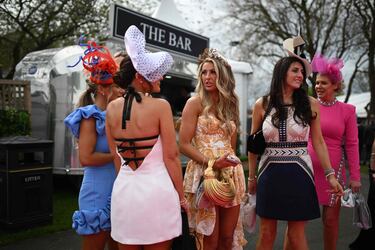 Racegoers attend the second day of the Grand National Festival horse race meeting at Aintree Racecourse in Liverpool, north-west England, on April 12, 2024. (Photo by Oli SCARFF / AFP)