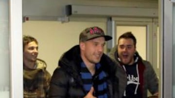 Podolski, al llegar a Milán.