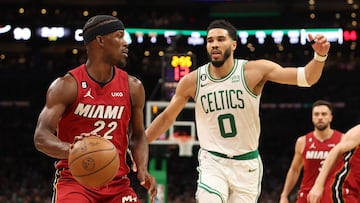 BOSTON, MASSACHUSETTS - MAY 17: Jimmy Butler #22 of the Miami Heat is defended by Jayson Tatum #0 of the Boston Celtics during the third quarter of game one of the Eastern Conference Finals at TD Garden on May 17, 2023 in Boston, Massachusetts. NOTE TO USER: User expressly acknowledges and agrees that, by downloading and or using this photograph, User is consenting to the terms and conditions of the Getty Images License Agreement.   Adam Glanzman/Getty Images/AFP (Photo by Adam Glanzman / GETTY IMAGES NORTH AMERICA / Getty Images via AFP)