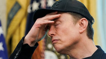 FILE PHOTO: Elon Musk reacts during a press conference with U.S. President Donald Trump (not pictured), at the White House in Washington, D.C., U.S., May 30, 2025. REUTERS/Nathan Howard/File Photo