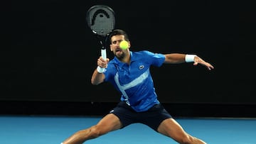 Serbia's Novak Djokovic hits a return against USA's Nishesh Basavareddy during their men's singles match on day two of the Australian Open tennis tournament in Melbourne on January 13, 2025. (Photo by DAVID GRAY / AFP) / -- IMAGE RESTRICTED TO EDITORIAL USE - STRICTLY NO COMMERCIAL USE --
