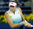 Muguruza gana en dobles con Carla y va a por Davis