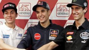 Los tres primeros clasificados del Mundial de Moto 3, los españoles Maverick Viñales, Luis Salom, y Álex Rins.