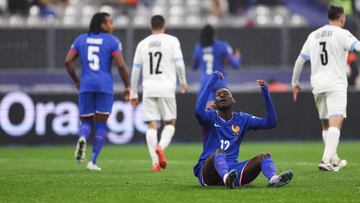 France's forward #12 Randal Kolo Muani reacts during the UEFA Nations League League A, Group A2 football match between France and Israel at The Stade de France stadium in Saint-Denis, in the northern outskirts of Paris, on November 14, 2024. (Photo by FRANCK FIFE / AFP)