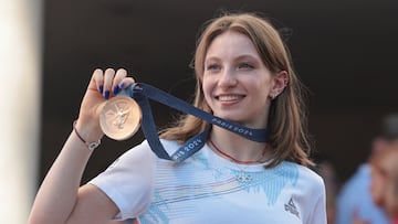 Romanian gymnast Ana Barbosu shows the media the Olympic bronze medal she was handed just minutes before, in Bucharest, Romania, August 16, 2024. Inquam Photos/George Calin via REUTERS ATTENTION EDITORS - THIS IMAGE WAS PROVIDED BY A THIRD PARTY. ROMANIA OUT. NO COMMERCIAL OR EDITORIAL SALES IN ROMANIA