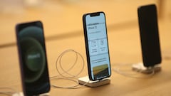 FILE PHOTO: IPhone 12 phones are seen at the new Apple Store on Broadway in downtown Los Angeles, California, U.S., June 24, 2021. REUTERS/Lucy Nicholson/File Photo