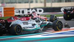 Pelea de Carlos Sainz (Ferrari F1-75) y Lewis Hamilton (Mercedes W13) en Yas Marina, Abu Dhabi. F1 2022.