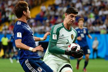 Yuya Osako y Thibaut Courtois.