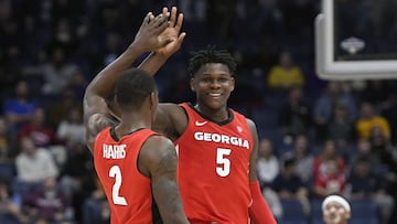 Mar 11, 2020; Nashville, Tennessee, USA; Georgia Bulldogs guard Anthony Edwards (5) and guard Jordan Harris (2) celebrate after defeating the Mississippi Rebels in the SEC conference tournament at Bridgestone Arena. Mandatory Credit: Steve Roberts-USA TODAY Sports